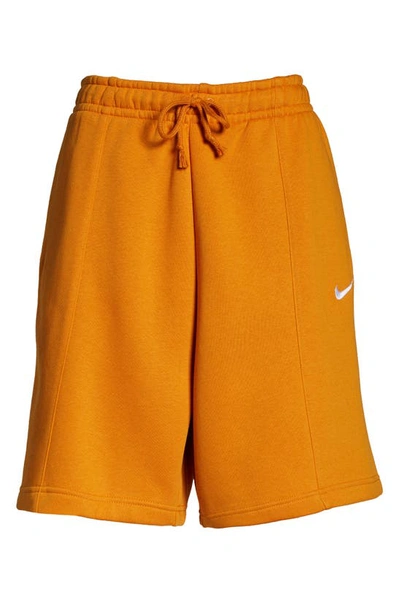 Shop Nike Sportswear Essential Fleece Shorts In Light Curry/ White
