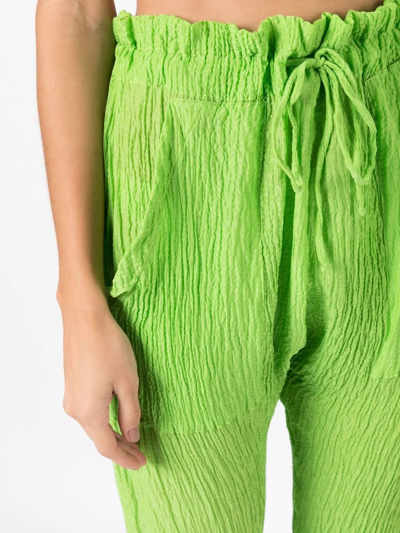 Shop Amir Slama Crinkle-effect Silk Trousers In Green