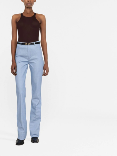 Saint Laurent Contrast-stitch Pressed-crease Flared-leg High-rise Cotton Trousers In Blau