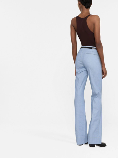 Saint Laurent Contrast-stitch Pressed-crease Flared-leg High-rise Cotton Trousers In Blau