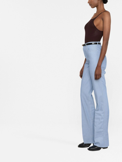 Saint Laurent Contrast-stitch Pressed-crease Flared-leg High-rise Cotton Trousers In Blau