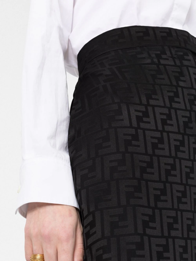 Shop Fendi Monogram-print Silk Trousers In Schwarz