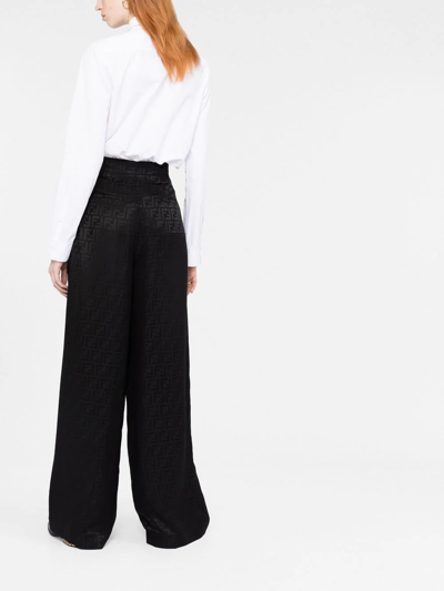 Shop Fendi Monogram-print Silk Trousers In Schwarz