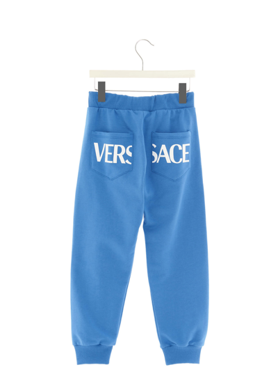 Shop Versace Greca Joggers In Blue