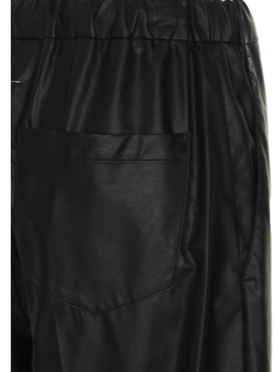 Shop Mm6 Maison Margiela Coated Trousers In Black