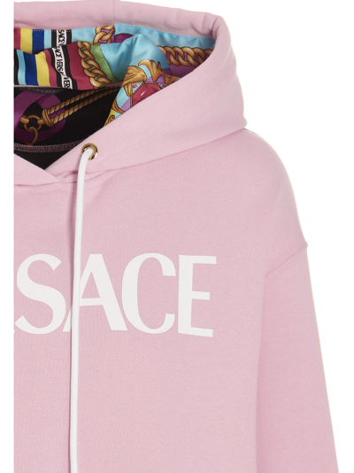 Versace Logo Oversized Cotton Jersey Hoodie In Pink