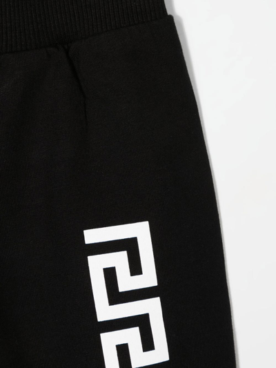Shop Versace Greca-print Stretch-cotton Track-pants In Black