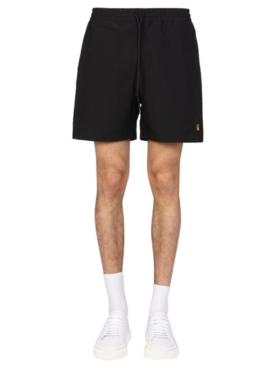 Shop Carhartt Wip Logo Embroidered Swim Trunks In Black