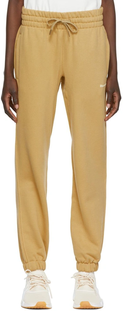 Shop Adidas X Humanrace By Pharrell Williams Tan Humanrace Basics Lounge Pants In Golden Beige