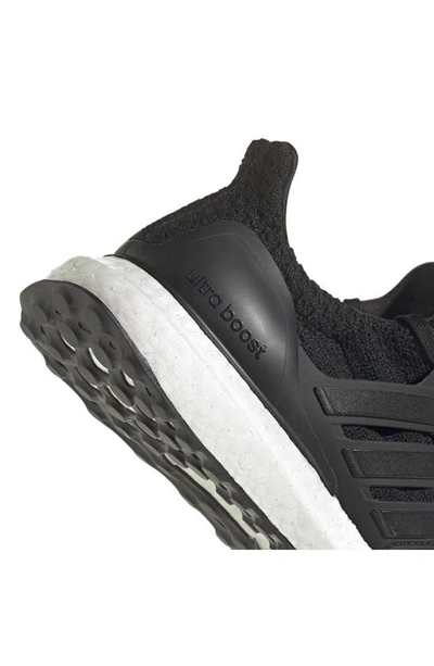 Shop Adidas Originals Ultraboost 5.0 Alphaskin Sneaker In Black/ Black/ Green