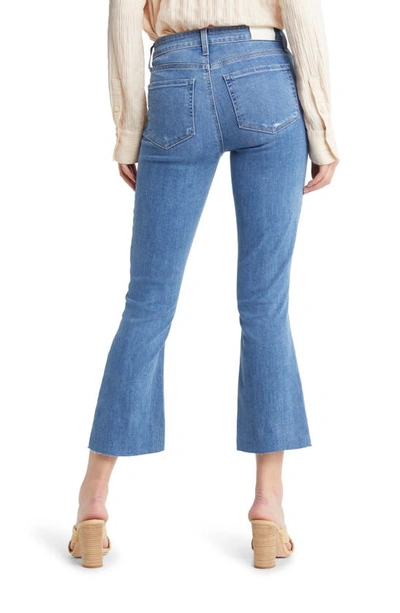 Shop Paige Shelby Mid Rise Raw Hem Crop Flare Jeans In Bliss Distressed