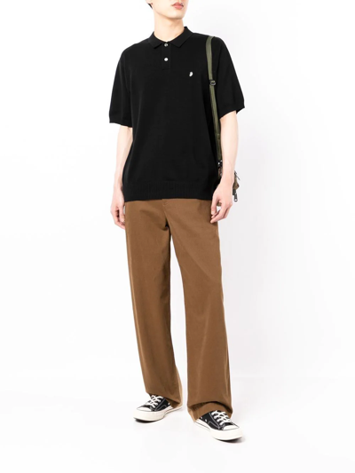 Shop Stussy Logo-embroidered Cotton Polo Shirt In Black