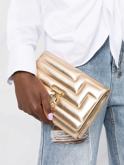 Shop Jimmy Choo Avenue Quilted Clutch In Gold