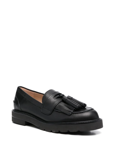 Shop Stuart Weitzman Tassel-detail Leather Loafers In Black