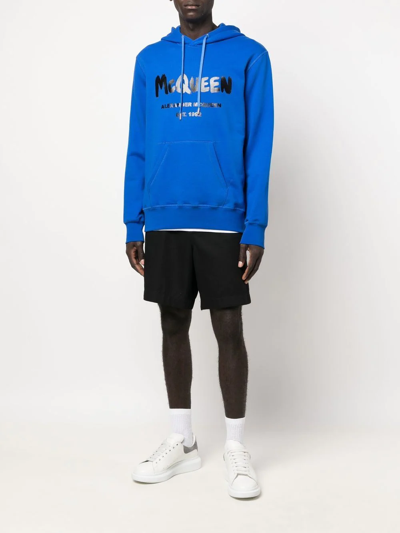 Shop Alexander Mcqueen Logo Graffiti-print Hoodie In Rot