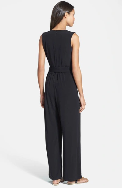 Shop Vince Camuto Faux Wrap Jersey Jumpsuit In Black