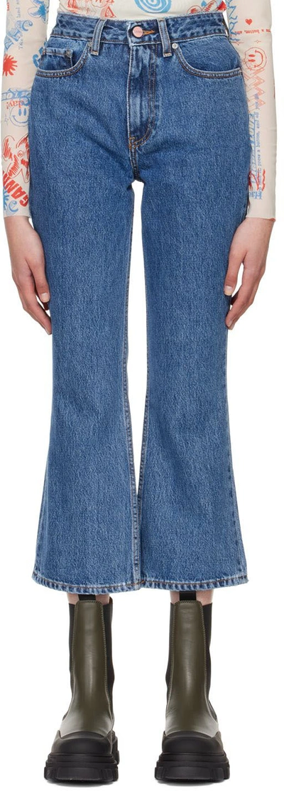 Shop Ganni Blue Betzy Bootcut Jeans In 566 Mid Blue Stone