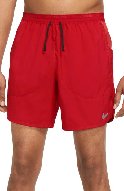 Shop Nike Dri-fit Stride Unlined Running Shorts In Red/ Black/ Reflective Silv