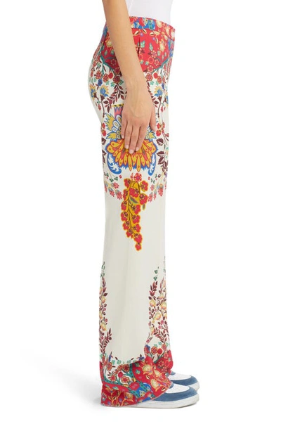 Shop Etro Floral Print Flare Trousers In White 990