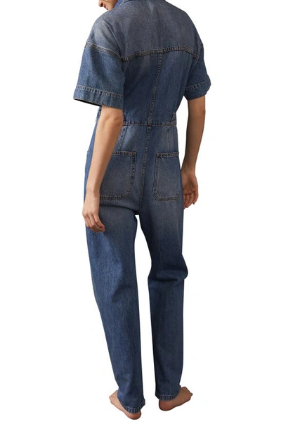 Shop Free People We The Free Marci Denim Jumpsuit In High Noon