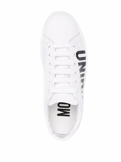 Shop Moschino Leather Logo Print Sneakers In White