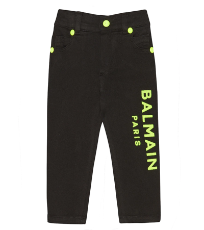 Shop Balmain Baby Logo Embroidered Jeans In Nero/giallo