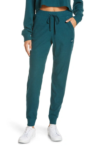 Shop Alo Yoga Muse High Waist Rib Joggers In Galactic Teal