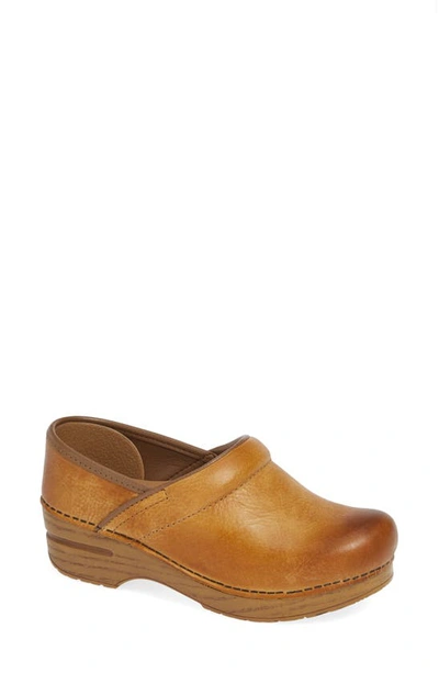 Shop Dansko 'professional' Clog In Honey Distressed Leather