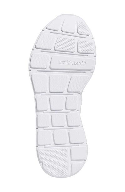 Shop Adidas Originals Gender Inclusive Swift Run Sneaker In White/ White/ White