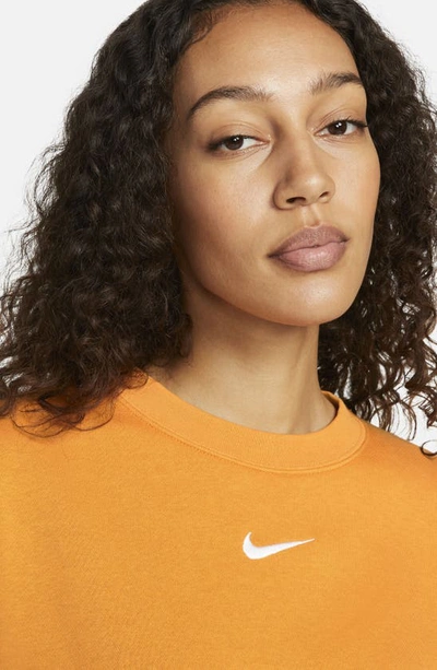Shop Nike Sportswear Essential Oversize Sweatshirt In Light Curry/ White