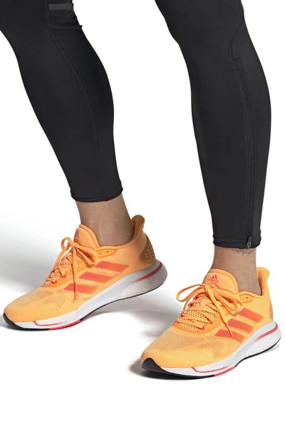 Shop Adidas Originals Supernova Running Shoe In Flash Orange/ Black/ Turbo