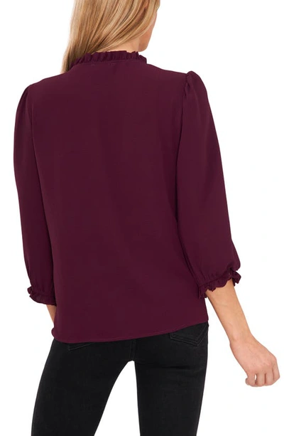 Shop Cece Ruffle V-neck Blouse In Deep Mulberry