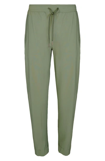 Shop Sweaty Betty Explorer Tapered Athletic Pants In Heath Green