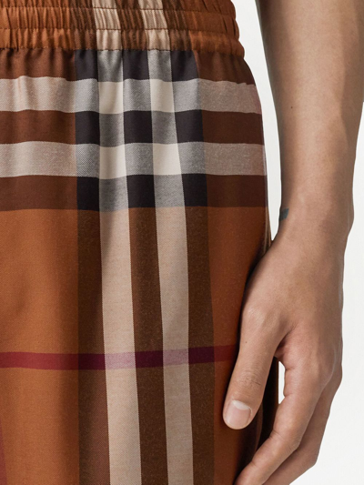 Shop Burberry Check-pattern Knee-length Shorts In Brown