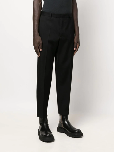 Jil Sander Wool Logo Trousers Tapered Leg In Schwarz