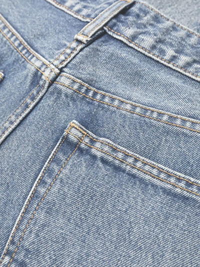 Shop Ganni Logo-patch Straight-leg Jeans In Blau