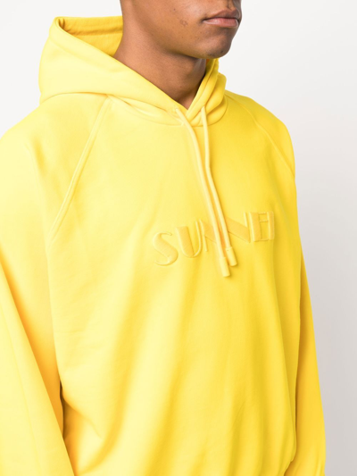 Shop Sunnei Logo Drawstring Hoodie In Gelb