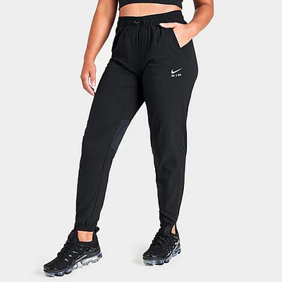 Shop Nike Women's Air Dri-fit Running Pants In Black/black/black