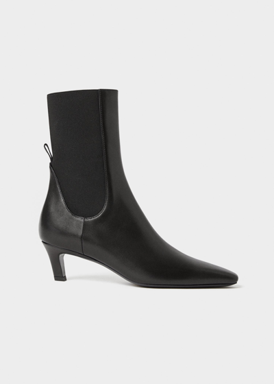 Shop Totême The Mid Heel Leather Boot Black