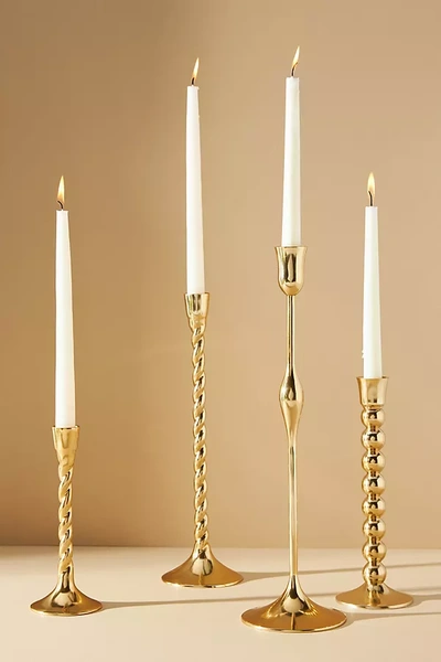 Shop Anthropologie Lumiere Taper Candlestick In Gold
