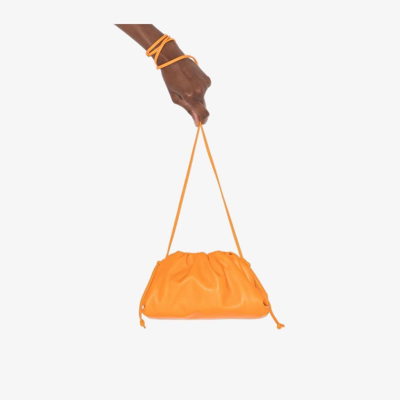 Shop Bottega Veneta Orange Mini Pouch Leather Clutch Bag