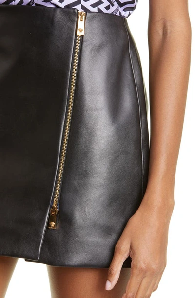 Shop Versace Medusa Embellished Leather Miniskirt In Black