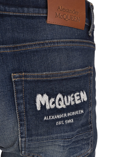 Shop Alexander Mcqueen Man Mcqueen Graffiti Jeans In Medium Blue Denim In Blue Washed