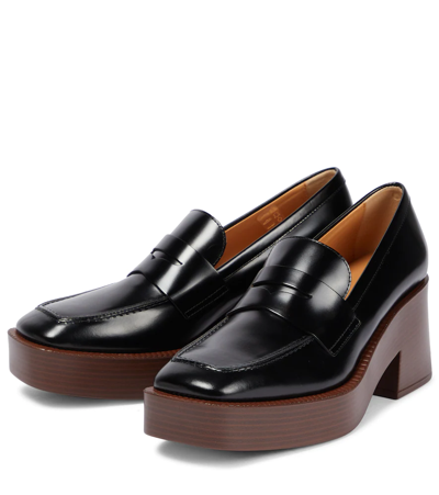 Shop Tod's Leather Platform Loafers In Nero