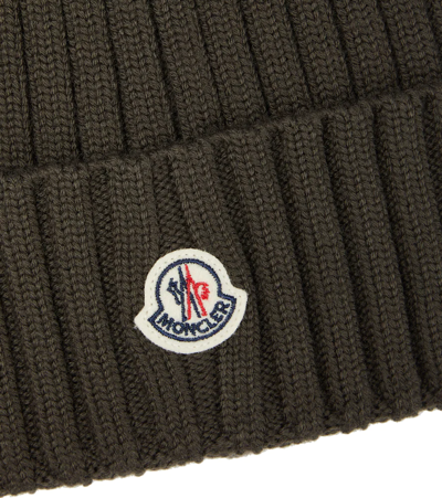 Shop Moncler Ribbed-knit Virgin Wool Beanie In Military