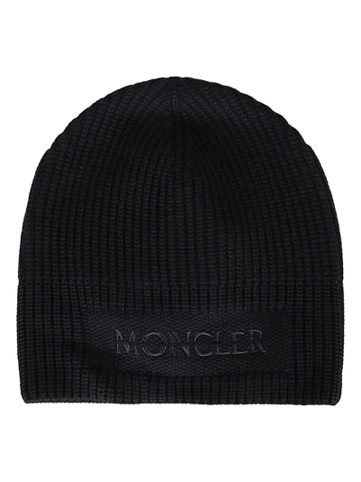Shop Moncler Logo Embroidered Ribbed Beanie In Black