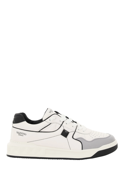 Shop Valentino One Stud Low-top Sneakers In White,grey,black