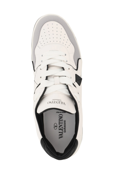 Shop Valentino One Stud Low-top Sneakers In White,grey,black