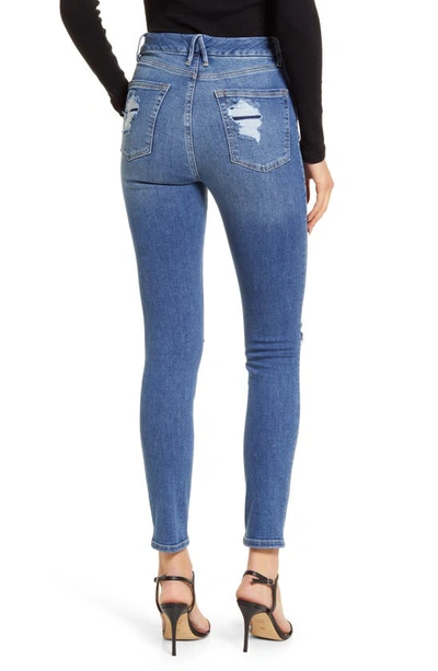 Shop Good American Good Legs Ripped Ankle Skinny Jeans In Blue785
