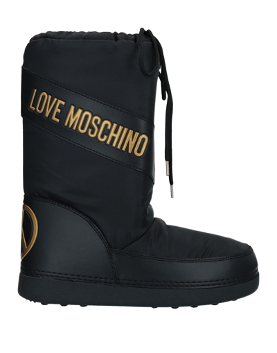 Shop Love Moschino Knee Boots In Black